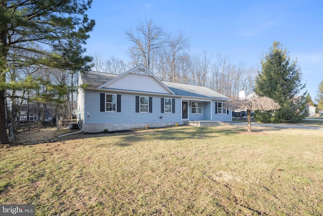 single story home with a front yard