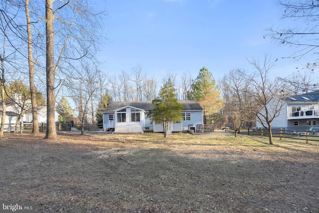 view of front of home with fence