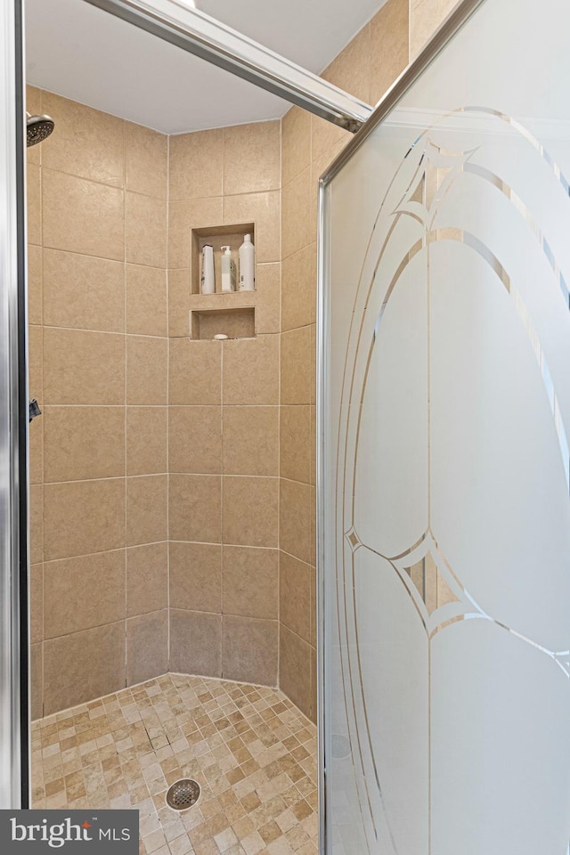 full bathroom with a stall shower