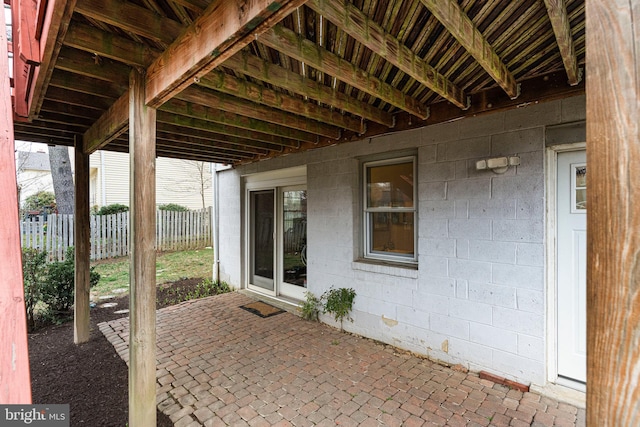 view of patio / terrace featuring fence