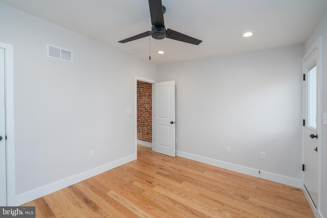 unfurnished bedroom featuring recessed lighting, visible vents, baseboards, and light wood-style flooring