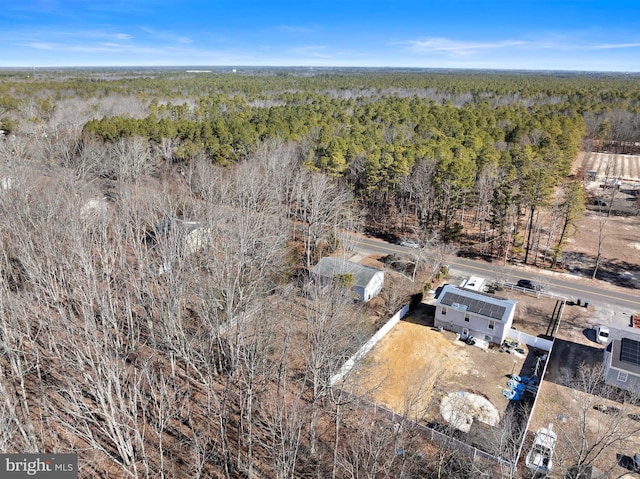 bird's eye view featuring a forest view