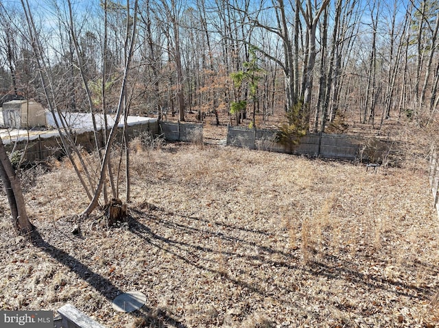 view of yard with fence