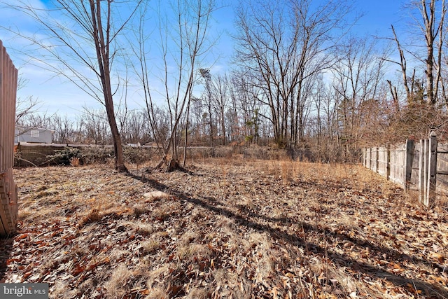 view of yard featuring fence