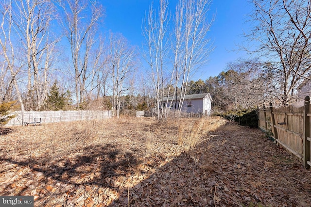 view of yard featuring fence