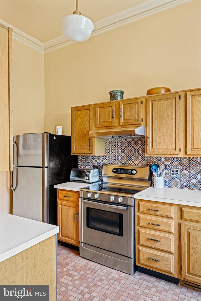 kitchen with crown molding, light countertops, backsplash, and stainless steel appliances