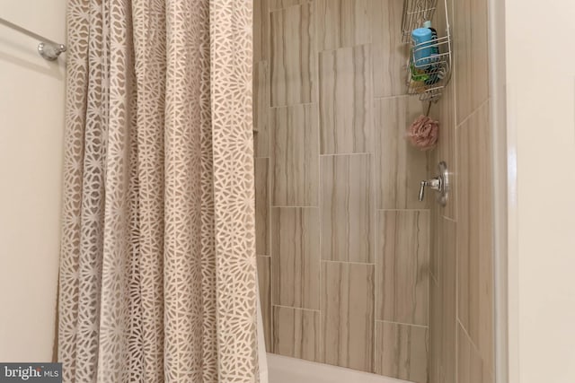 full bath with a shower with curtain