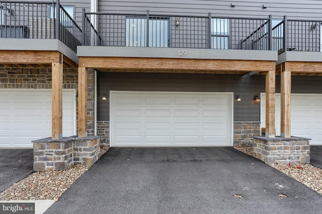 garage featuring driveway