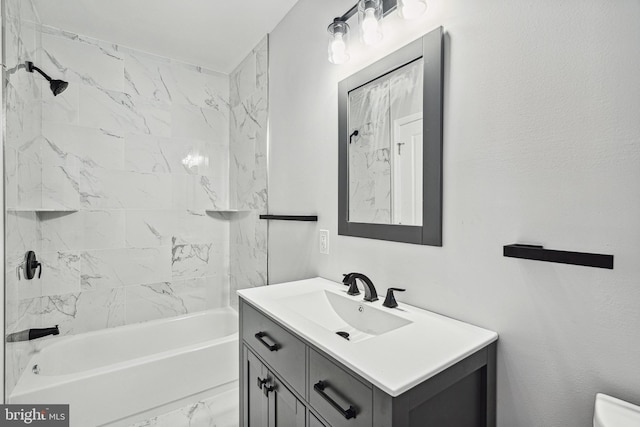 full bathroom with marble finish floor, bathtub / shower combination, and vanity