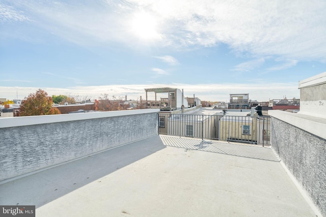 view of patio featuring a balcony