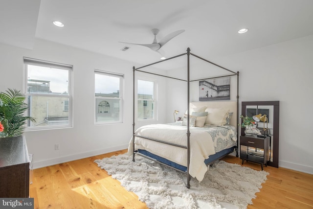 bedroom featuring recessed lighting, ceiling fan, baseboards, and wood finished floors