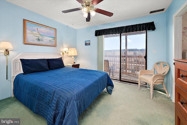 bedroom featuring ceiling fan, visible vents, carpet floors, and access to exterior