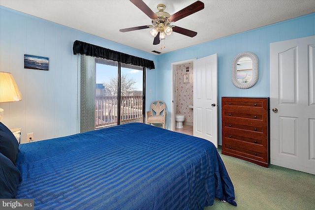 bedroom with a ceiling fan, carpet, visible vents, access to outside, and connected bathroom