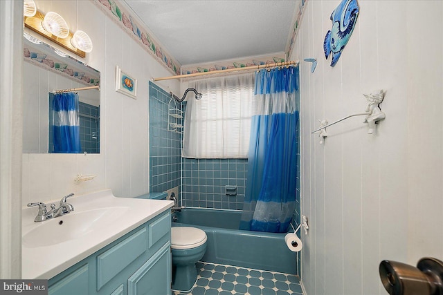 full bath featuring shower / bathtub combination with curtain, toilet, vanity, and a textured ceiling