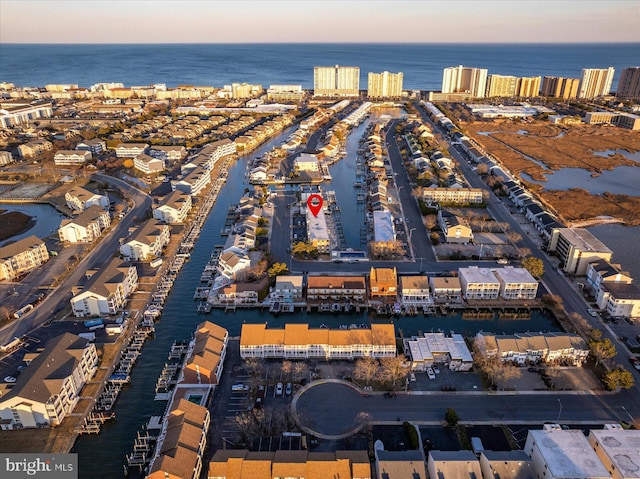 drone / aerial view featuring a water view