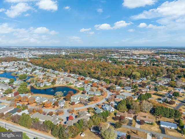 bird's eye view featuring a residential view and a water view