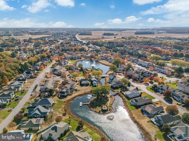 aerial view featuring a residential view and a water view