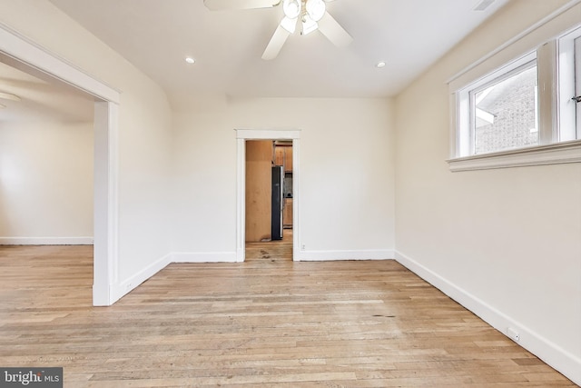 unfurnished room featuring recessed lighting, light wood-style floors, baseboards, and ceiling fan