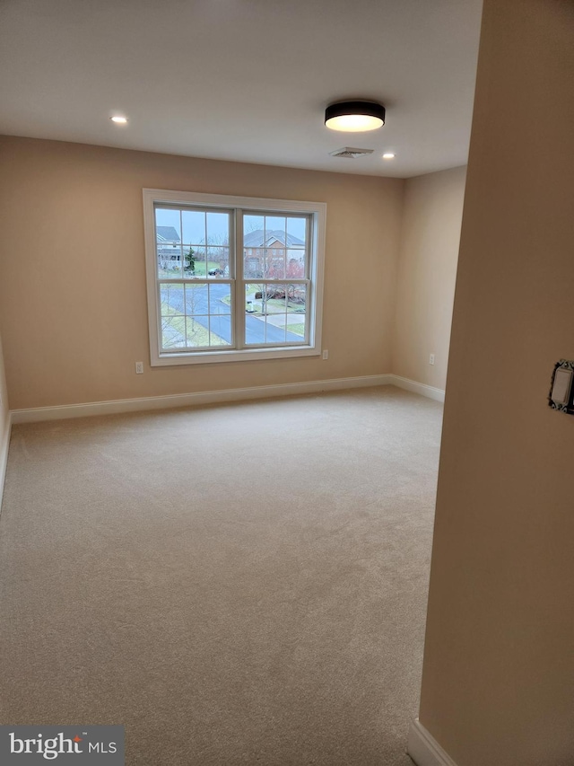 240 Banyan Dr, State College, PA 16801 - carpeted spare room featuring baseboards, visible vents, and recessed lighting