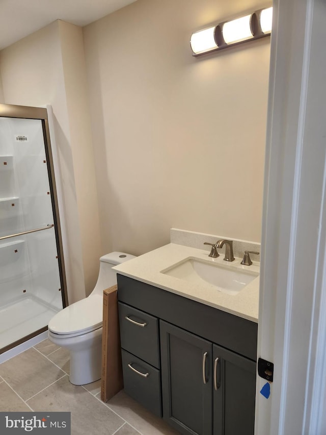 240 Banyan Dr, State College, PA 16801 - full bathroom with toilet, vanity, a stall shower, and tile patterned floors