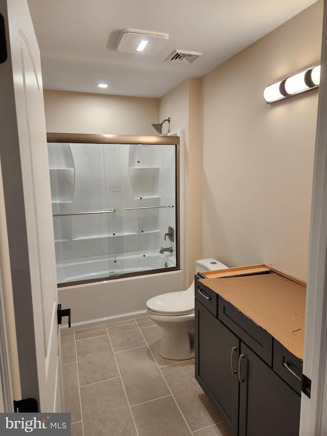 240 Banyan Dr, State College, PA 16801 - full bathroom featuring enclosed tub / shower combo, toilet, tile patterned flooring, visible vents, and recessed lighting