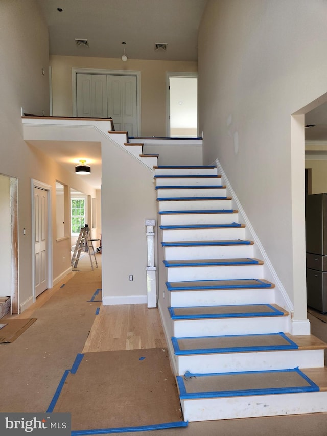 240 Banyan Dr, State College, PA 16801 - staircase with baseboards and visible vents