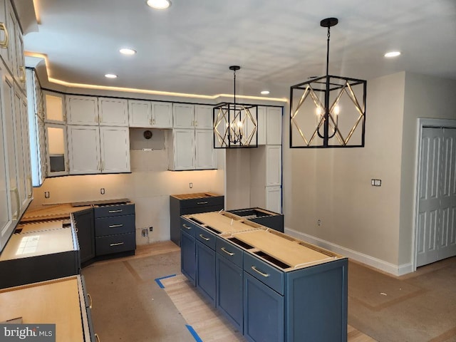 240 Banyan Dr, State College, PA 16801 - kitchen with finished concrete floors, baseboards, decorative light fixtures, and recessed lighting