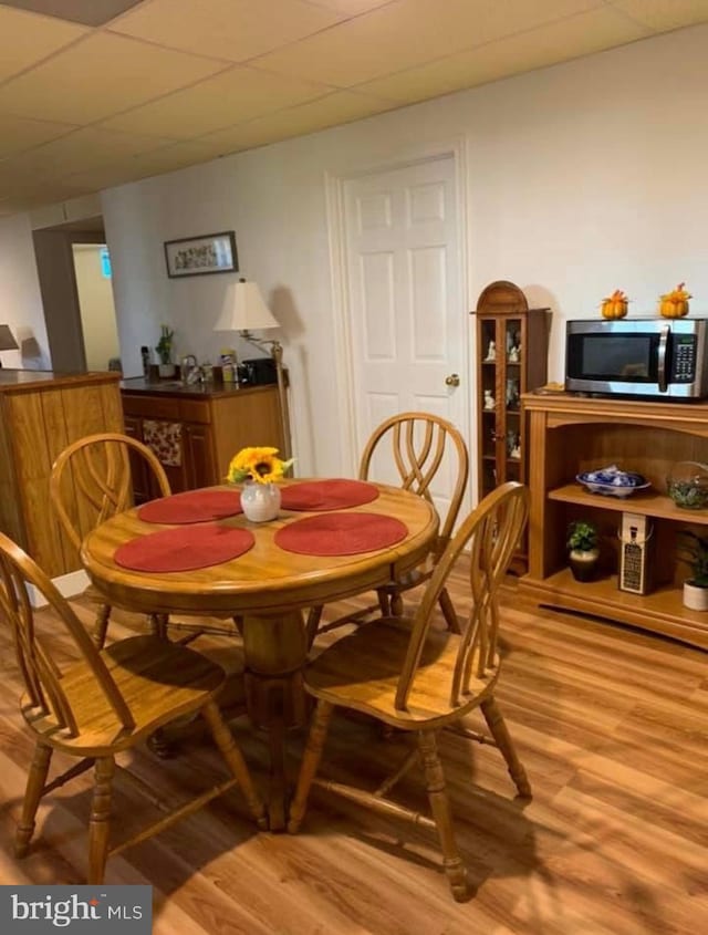 dining room with wood finished floors