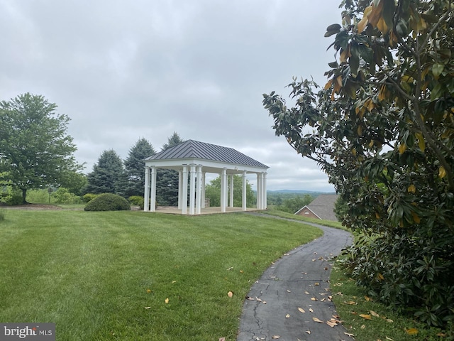 view of home's community featuring a gazebo and a lawn