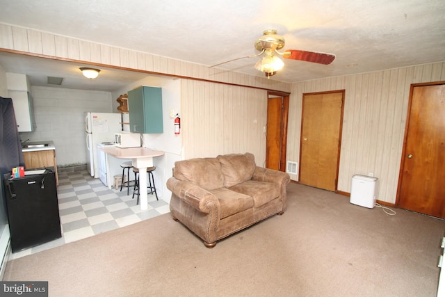 115 Crestmont Ave, State College, PA 16801 - living room with light colored carpet, light floors, visible vents, and ceiling fan