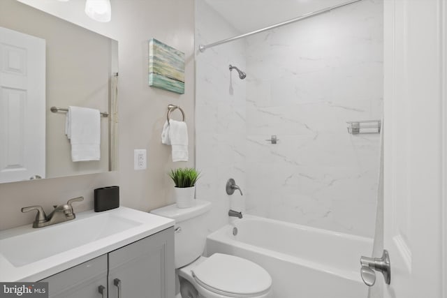 full bathroom featuring vanity, shower / tub combination, and toilet