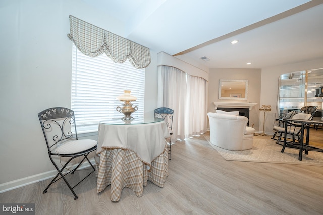 dining area with recessed lighting, visible vents, baseboards, and wood finished floors