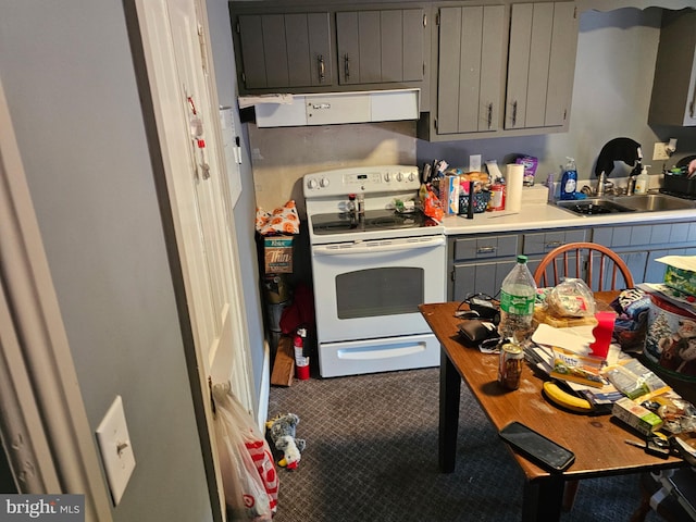 kitchen featuring gray cabinets, white electric range, a sink, exhaust hood, and light countertops