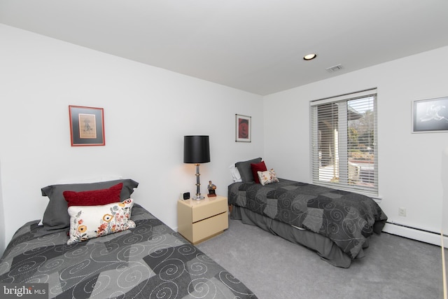 carpeted bedroom with recessed lighting, visible vents, and baseboard heating