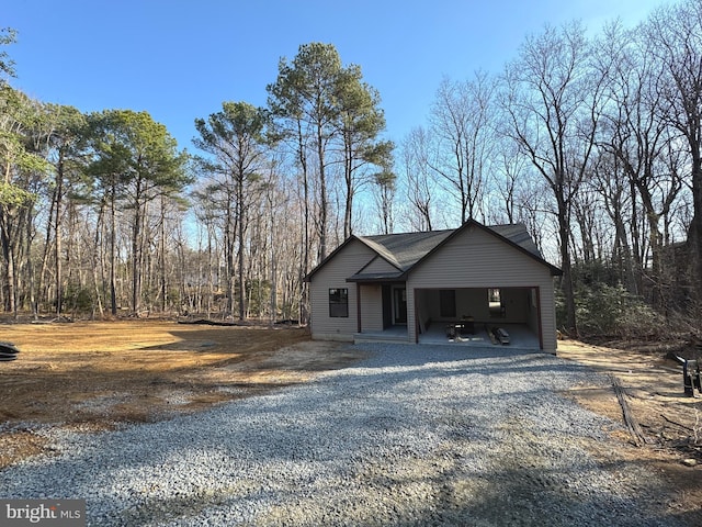 view of front facade with a carport and driveway