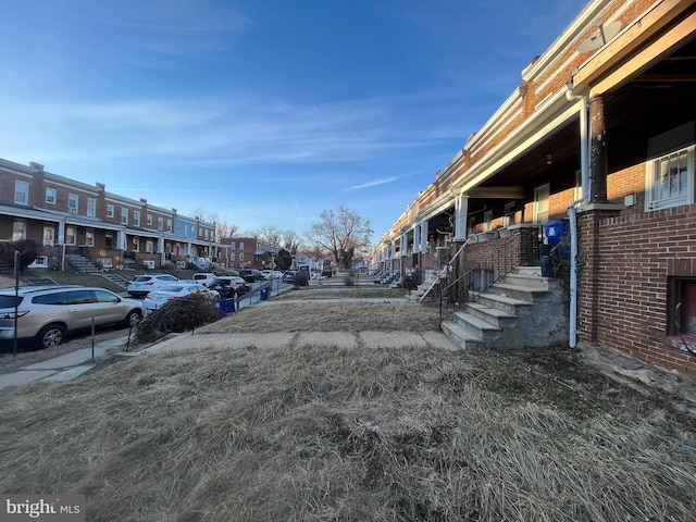 view of road with a residential view