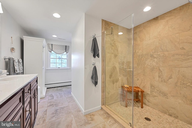 full bath featuring recessed lighting, a baseboard radiator, baseboards, walk in shower, and vanity