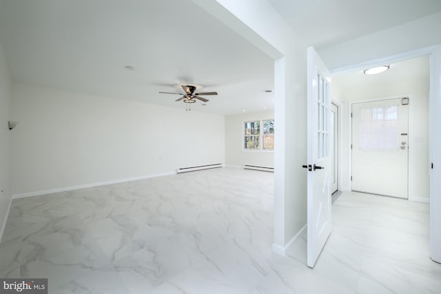 interior space with a ceiling fan, baseboards, a baseboard heating unit, marble finish floor, and baseboard heating