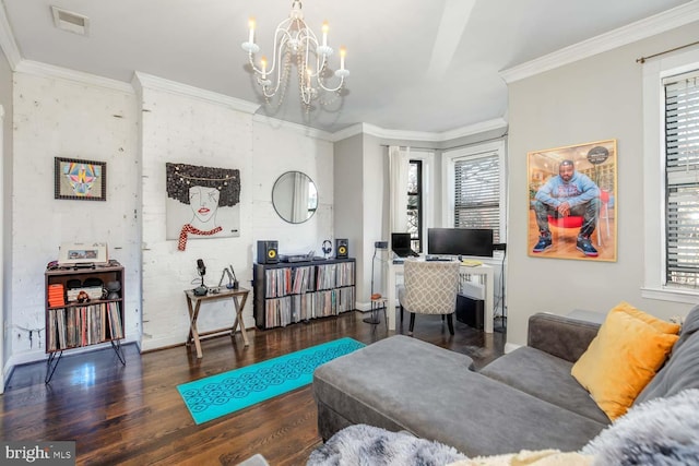 office area with a healthy amount of sunlight, a chandelier, and crown molding