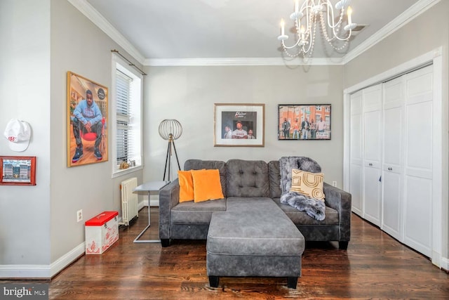 sitting room featuring an inviting chandelier, radiator heating unit, and ornamental molding