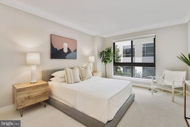 bedroom featuring baseboards, carpet floors, and ornamental molding