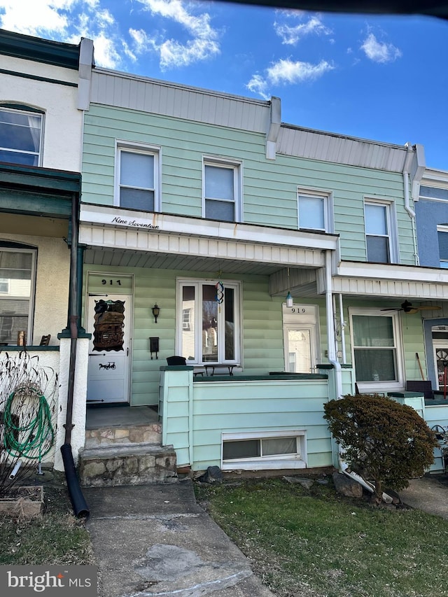 view of property with a porch