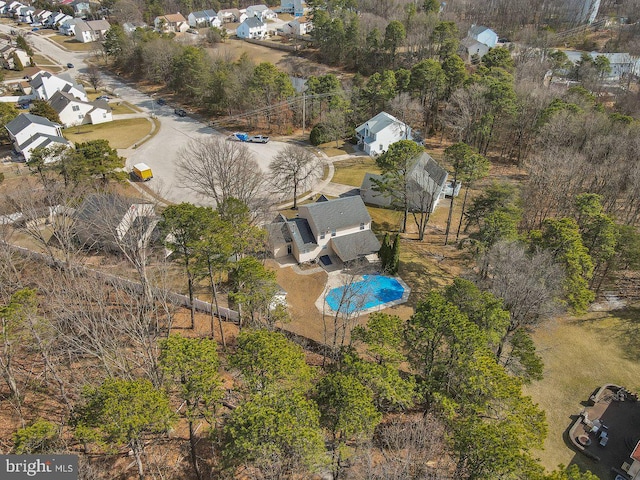 birds eye view of property with a residential view