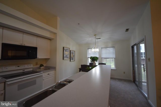 kitchen featuring a sink, dark carpet, white cabinetry, white electric stove, and black microwave