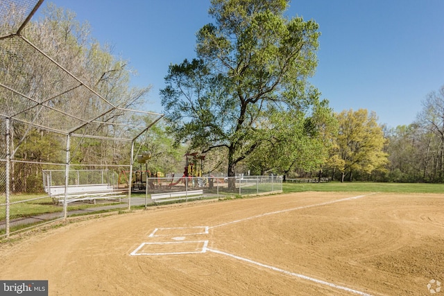 view of community featuring fence