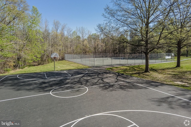 view of sport court with community basketball court and fence