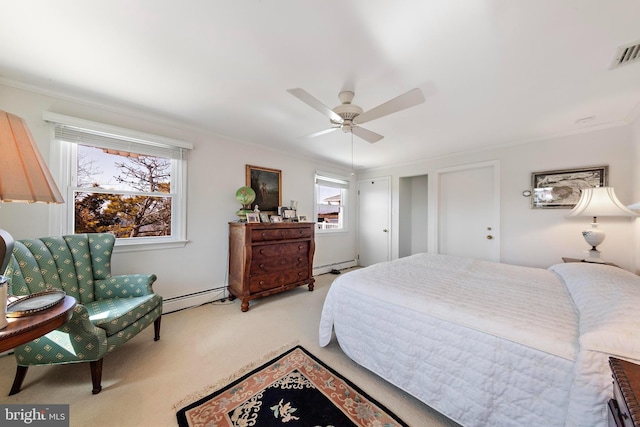 carpeted bedroom with ceiling fan, visible vents, baseboard heating, and ornamental molding