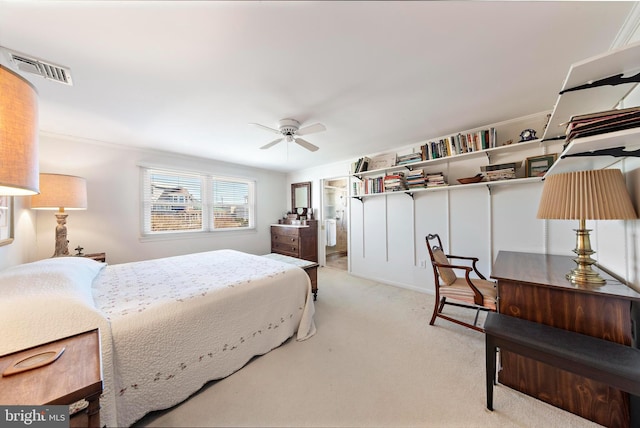 bedroom featuring visible vents, a ceiling fan, and carpet floors