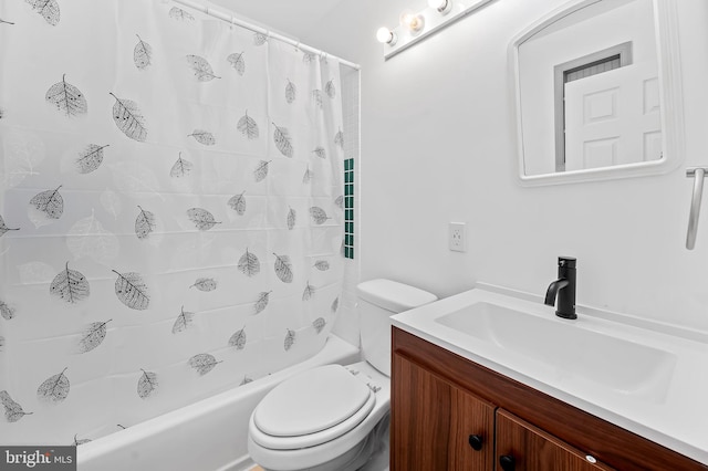 bathroom featuring toilet, vanity, and shower / bathtub combination with curtain