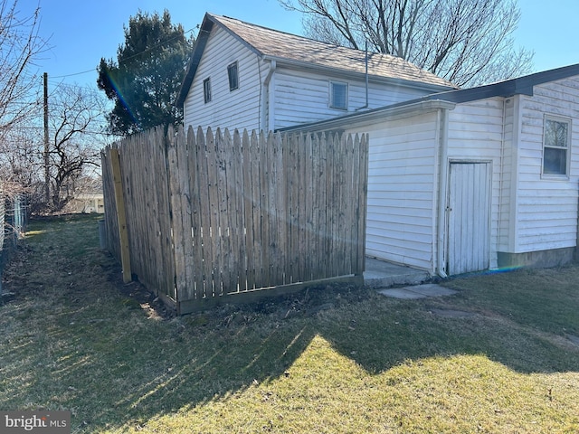 view of outdoor structure with fence